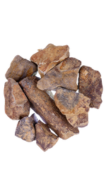 A dish of irregularly shaped stones on hues of orange and brown