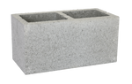 A rectangular besser block used in construction