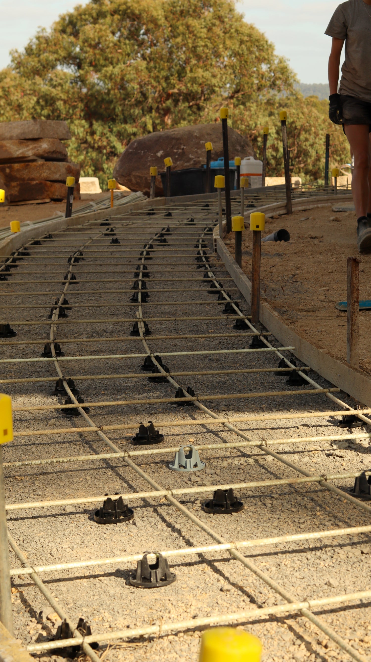 GFRP reinforcement laid out in a grid for a paving slab