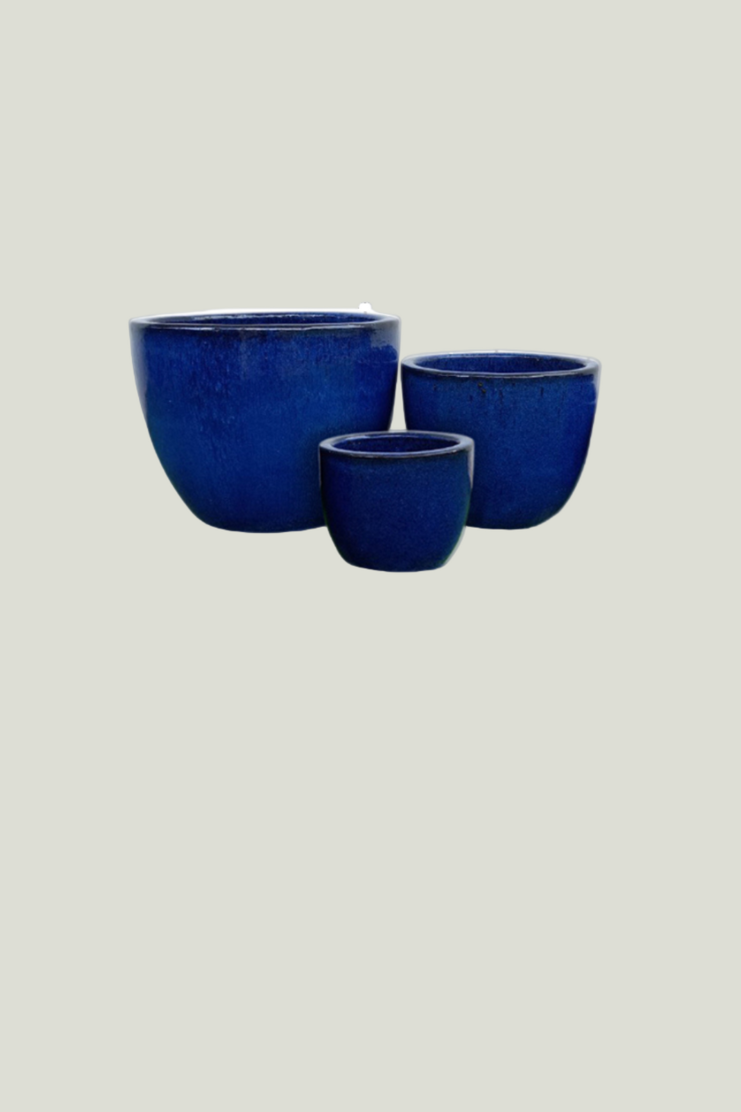 Set of three blue ceramic planters