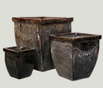 Set of three textured dark-toned planters