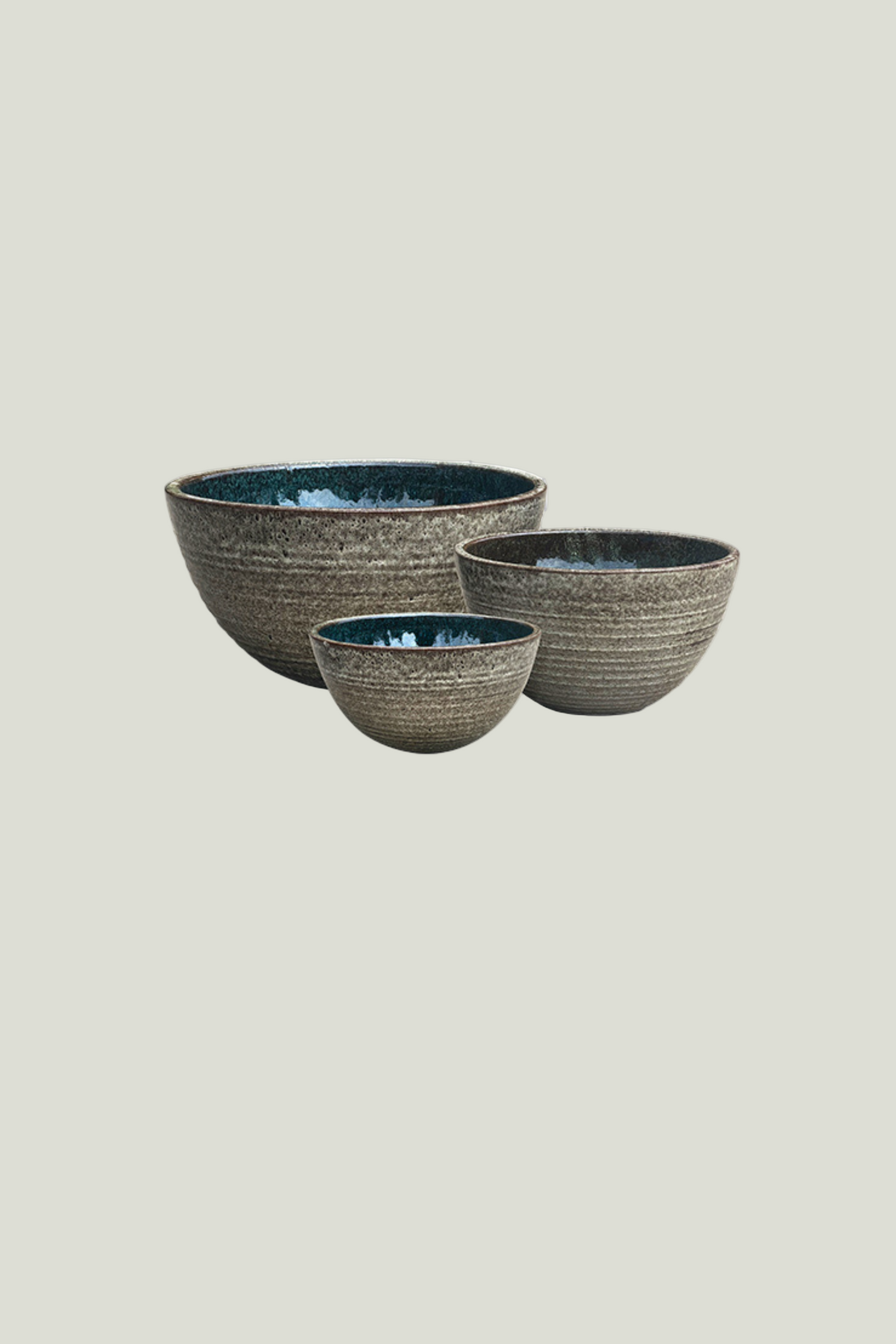 Set of three ceramic bowls with textured finish