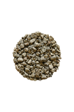 A close up of a petri dish full of small stones