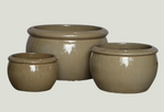 Three sandy ceramic bowls of different sizes