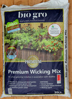 Bag of Bio Gro Premium Wicking Mix on a wooden surface