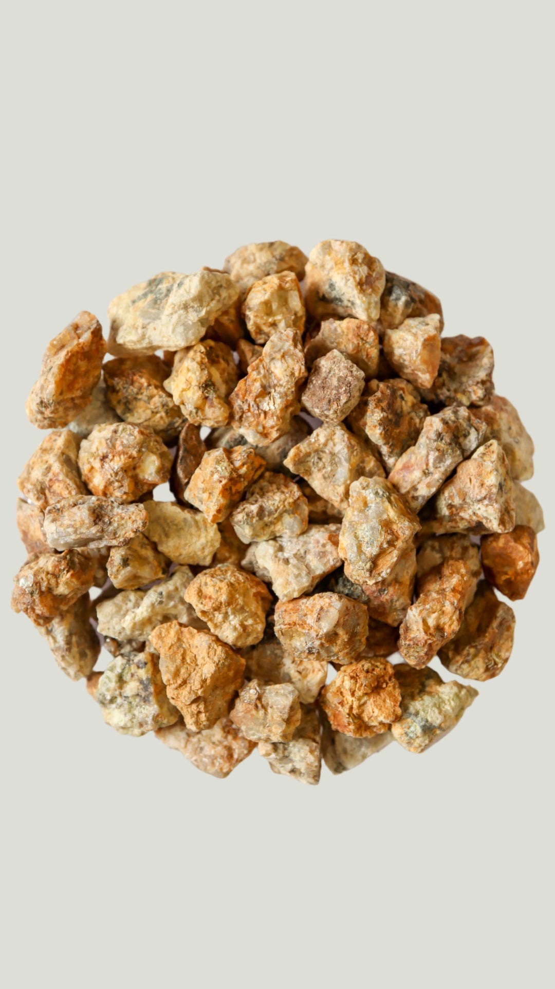 a dish of decorative stones