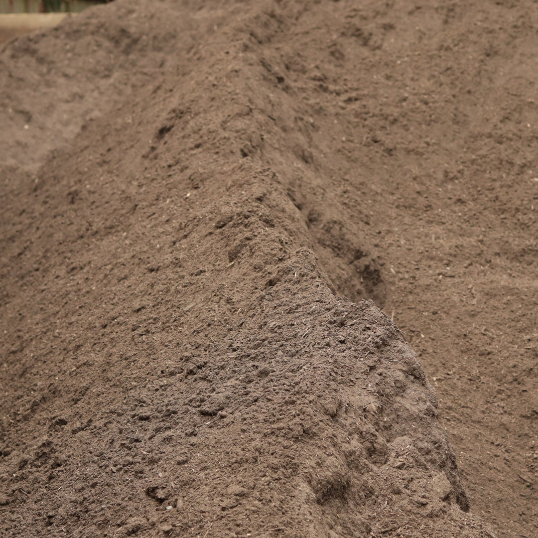 A bulk bay of garden soil