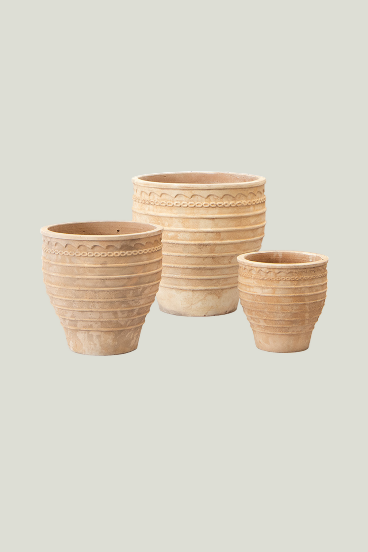 Three terracotta pots of different sizes