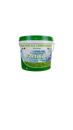 Lawn fertilizer container with green lid and label
