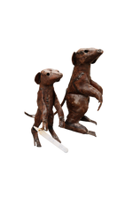 Two rusted metal sculptures of meerkats