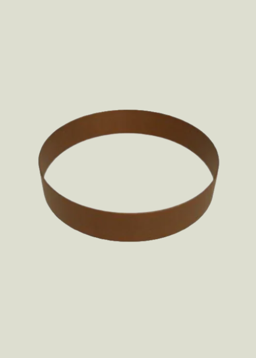 A weathered steel planter ring