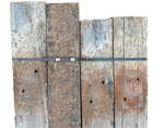 Three rustic wooden railway sleepers with visible grain and wear 